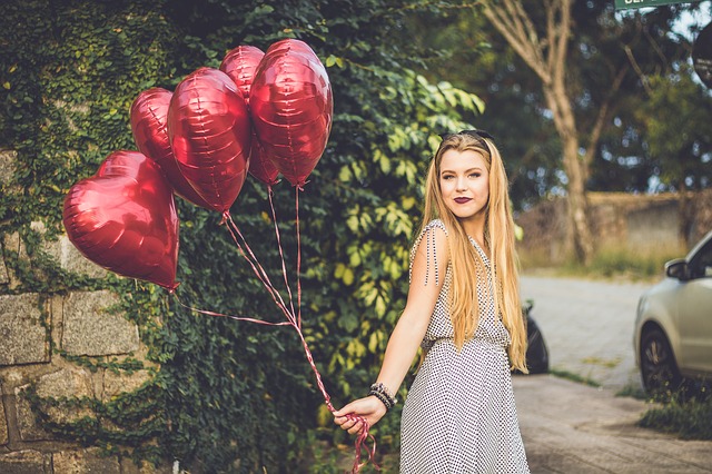 heart balloons with blonde girl